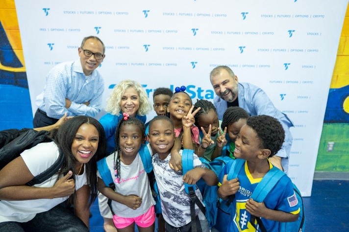 Photo of TradeStation employee and kids.